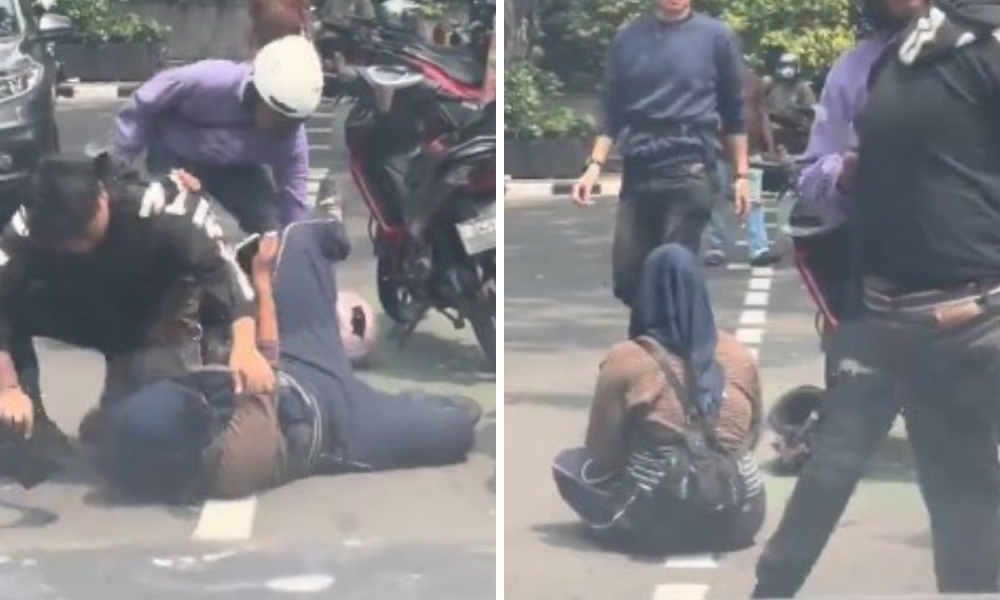 Viral! Pria Ngamuk ke Wanita, Banting Helm hingga Smackdown di Depan Umum