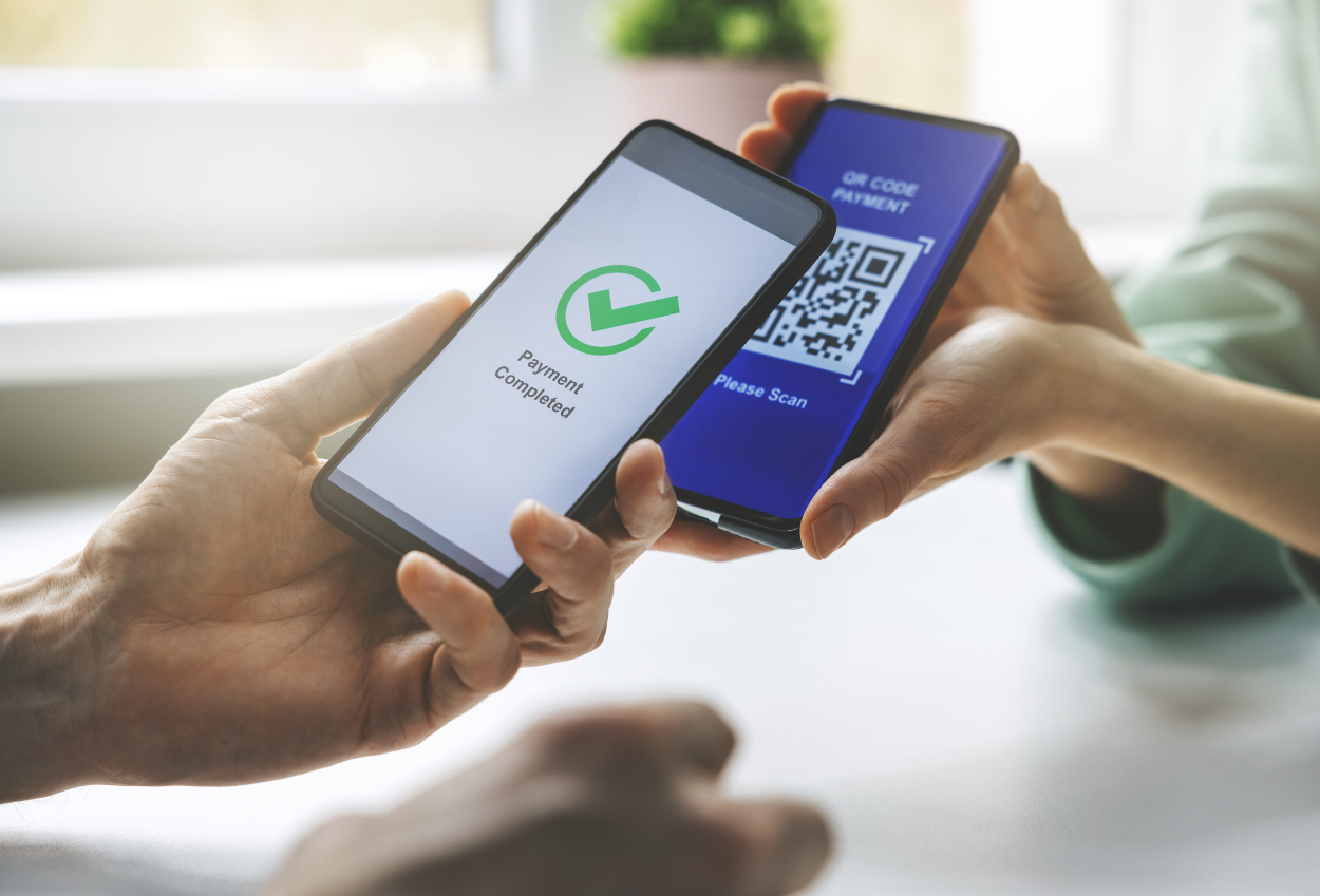 Tak Perlu Scan QR, Kini Pengguna QRIS Bisa Tempelkan Handphone ke Mesin Pembaca untuk Bertransaksi