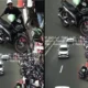 Viral! tukang parkir terekam kamera etle, polisi beri penjelasan