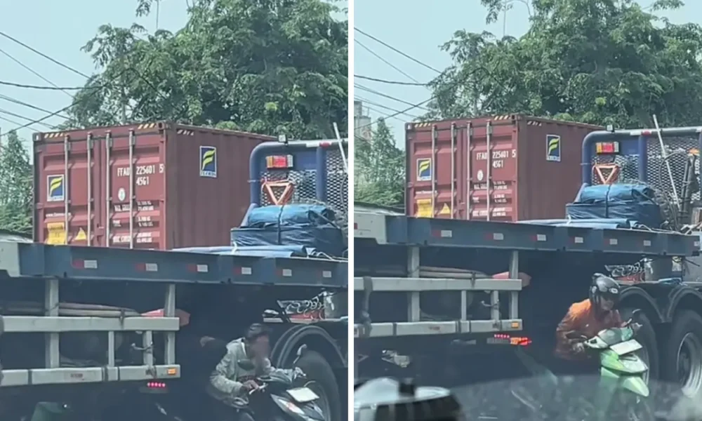 Pemotor nekat terobos kolong truk kontainer demi hindari macet